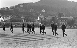 Stord under oppvarming/trening. Noen av spillerne trenger li