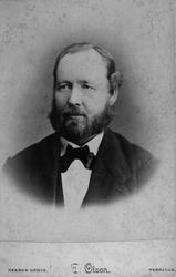 Portrettfoto av en ukjent mann. Trolig en utvandret nordmann