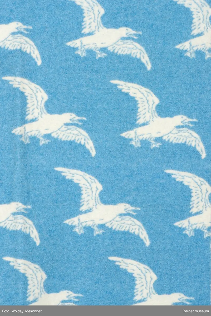 Pledd med måkemotiv