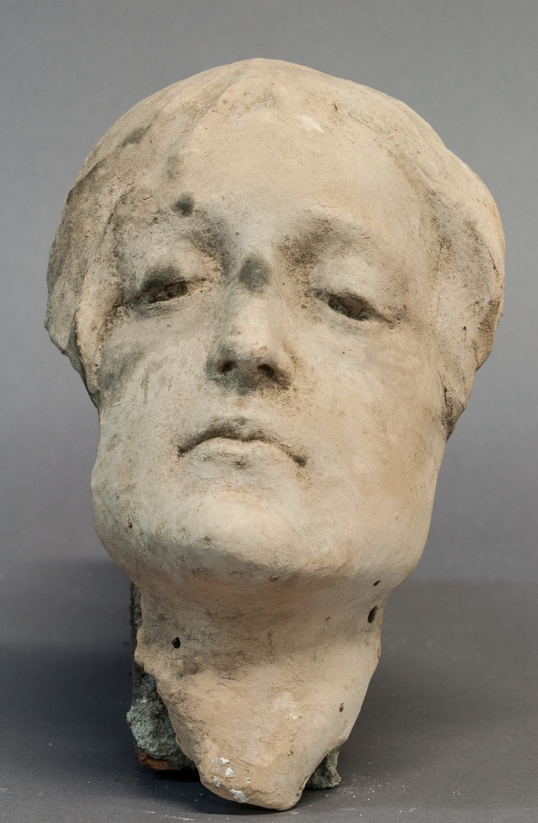 Skiss i terracotta, ansikte till Mattons grav.
