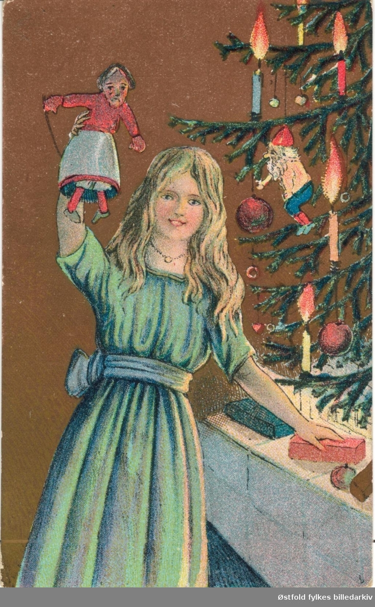 Julekort. Tegning. Juletre og jente med dokke og julegaver. Poststempla 1919.