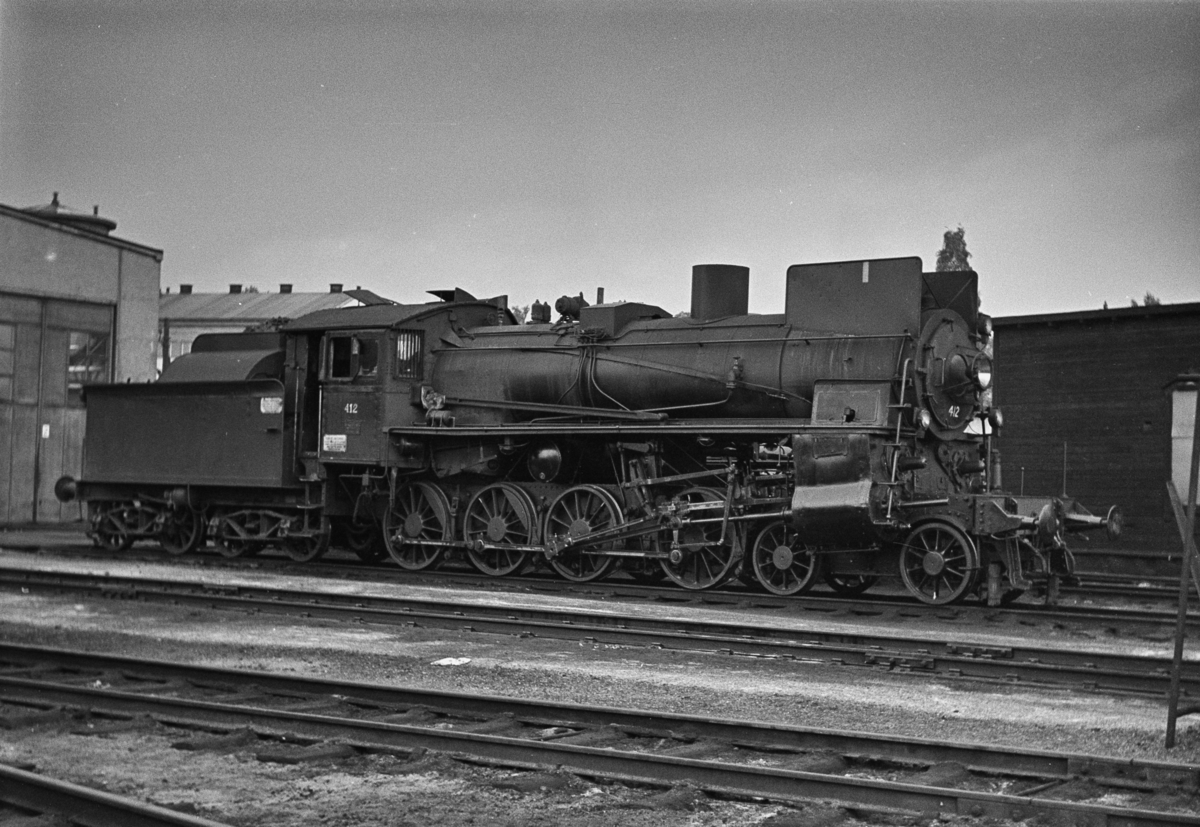Damplokomotiv type 26c nr. 412 ved lokomotivstallen på Hamar.
