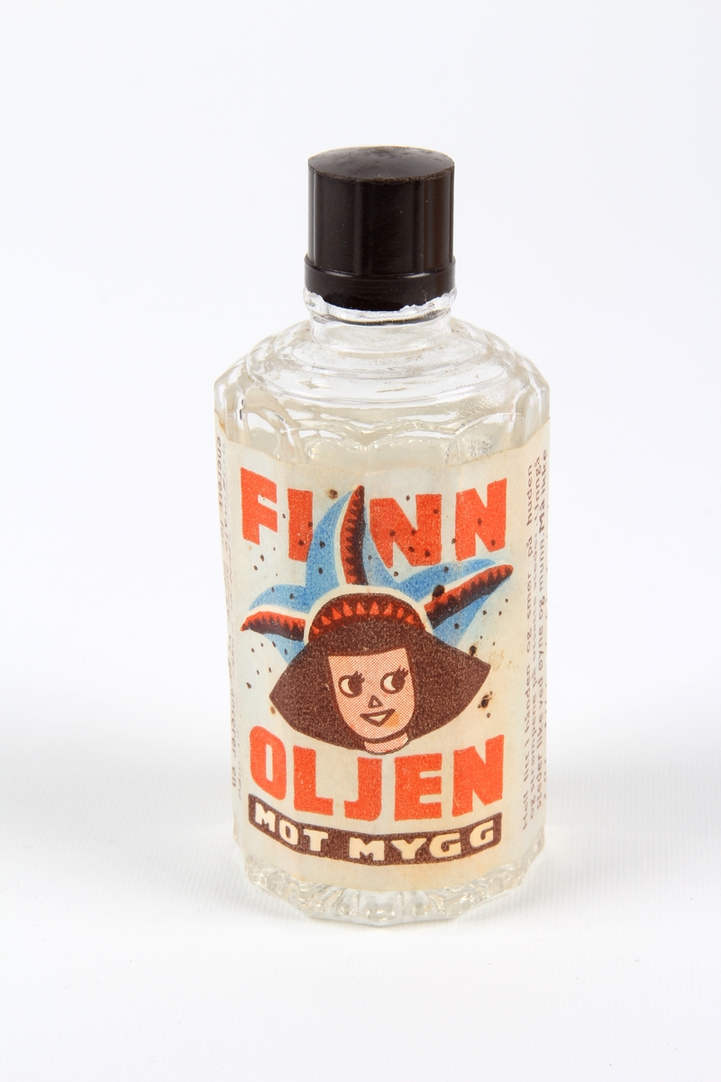 Glassflaske med myggmiddelet Finn-oljen. Beskytter mot myggstikk.