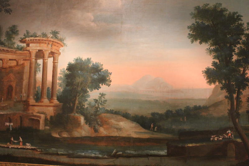 Maleri av et landskap med palassruiner i forgrunnen.