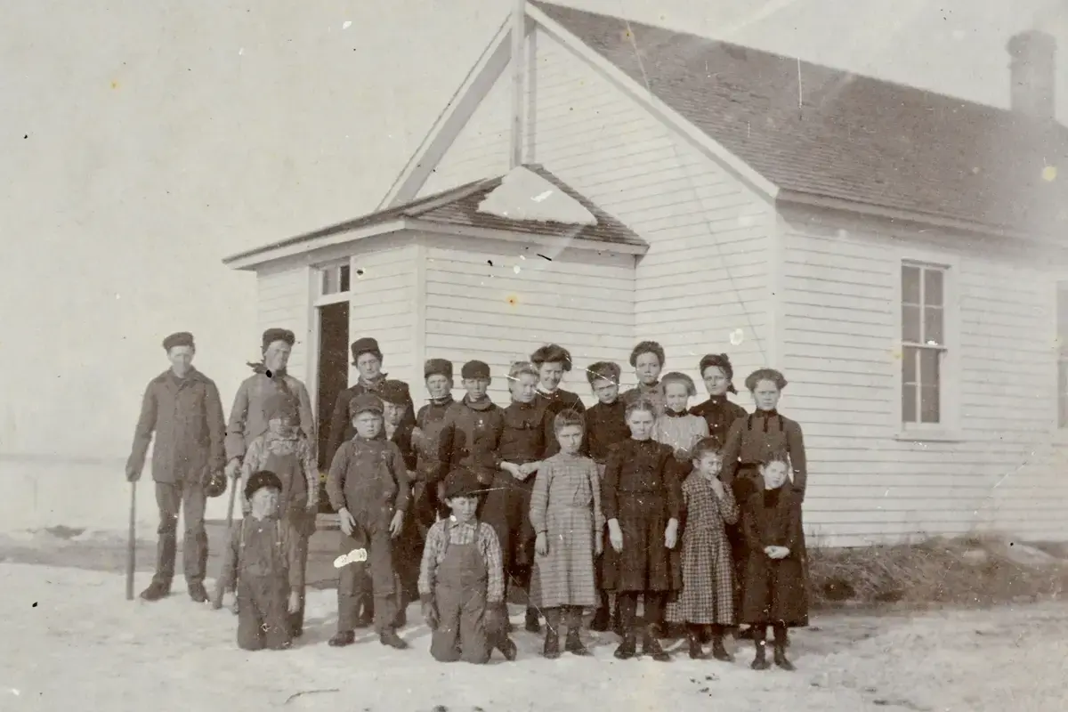 Students and teachers outside the school, USA, ca. 1882