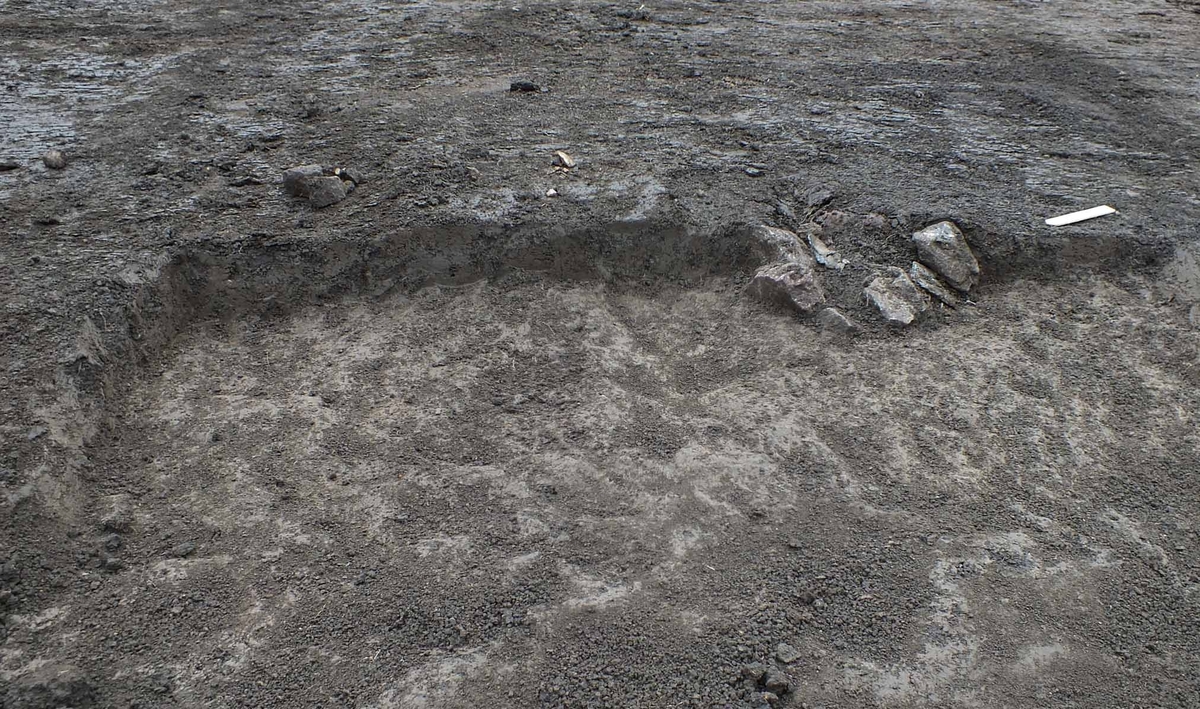Arkeologisk förundersökning, ruta grävd i lager A1250 med stolphål A661, Fyrislund, Vaksala socken, Uppland 2018