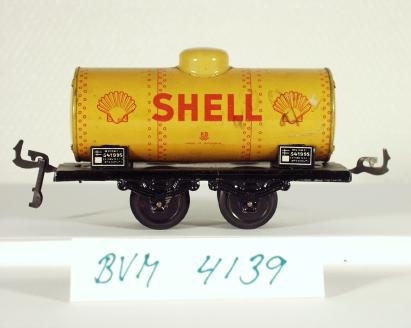 Modell av tankvagn, gul med Shell-märkning.
Spårvidd 0
