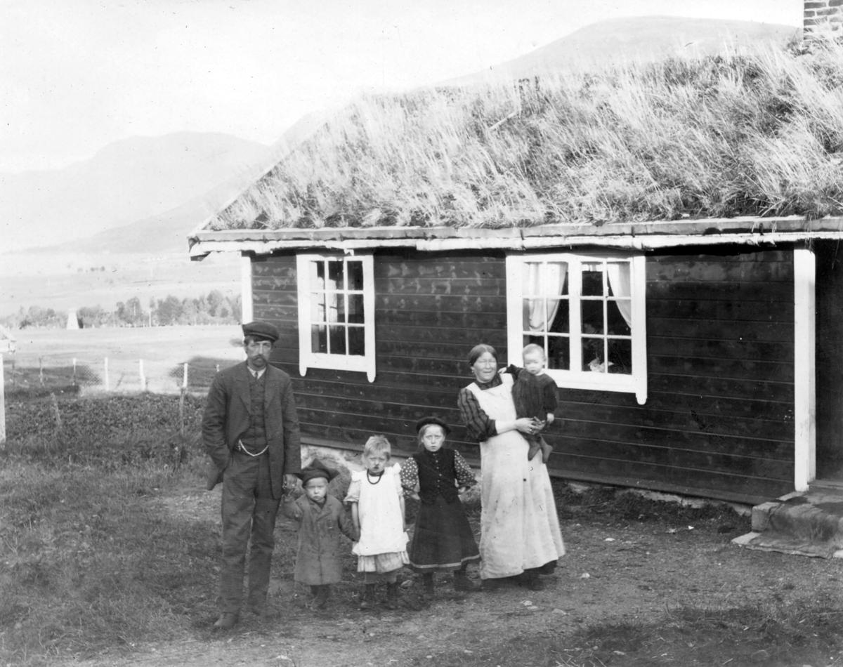 Family in front of house at Svanviken, ca. 1914.