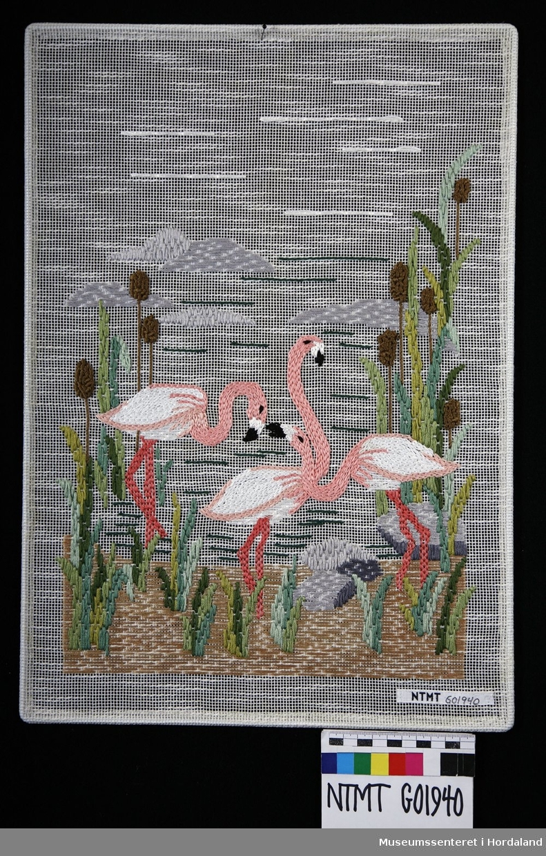 Tre flamingoer.