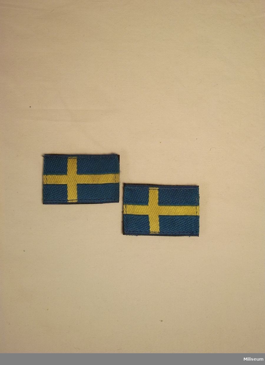 Nationsmärke m/94, svensk flagga, för "fin" uniform.