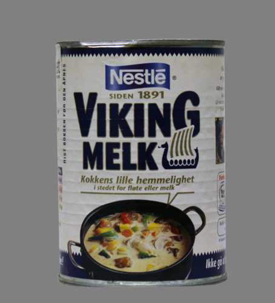 Uåpnet blikkboks som inneholder Viking melk. 