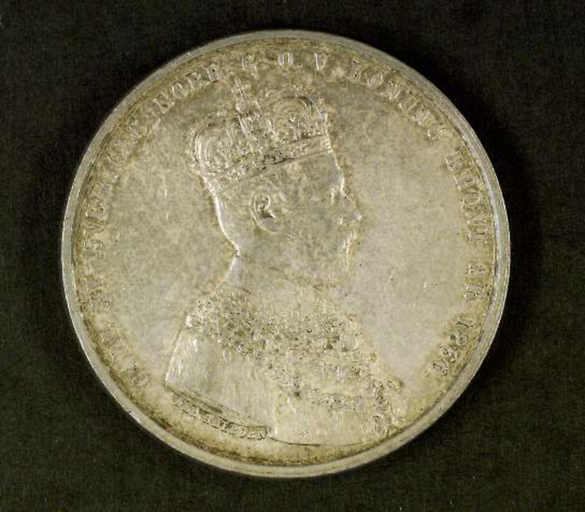 Porträtt av kung Karl XV.