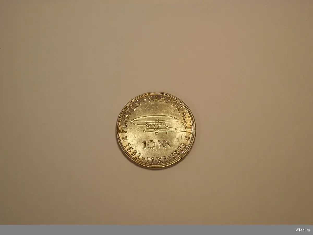 Silvermynt, 10 kr, präglat 1972 för att fira att Kung Gustaf VI Adolf fyllde 90 år.