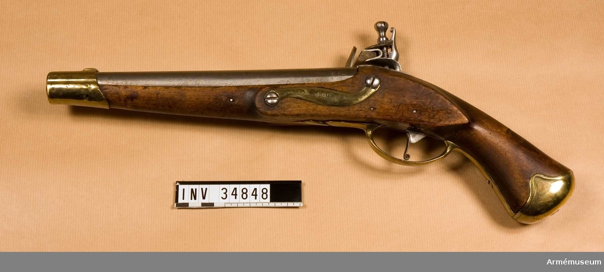 Grupp E III.
Pistol med flintlås, förändringsmodell från 1820-talet.
Kolvkappan märkt: 3-38. Låsblecket märkt "ALB".