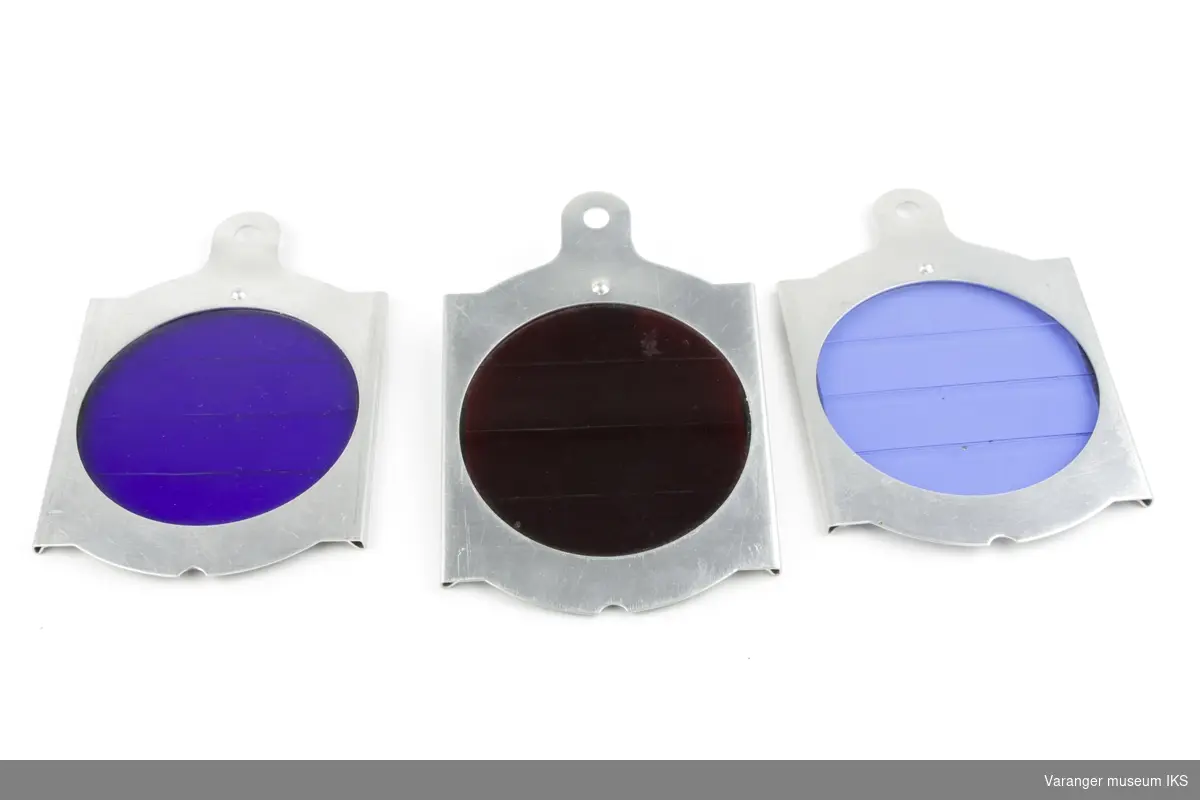Signalglass i ulike farger. Metallramme med farget glass.